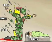 Soldier protecting sleeping child