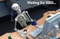Skeleton at desk/computer/work