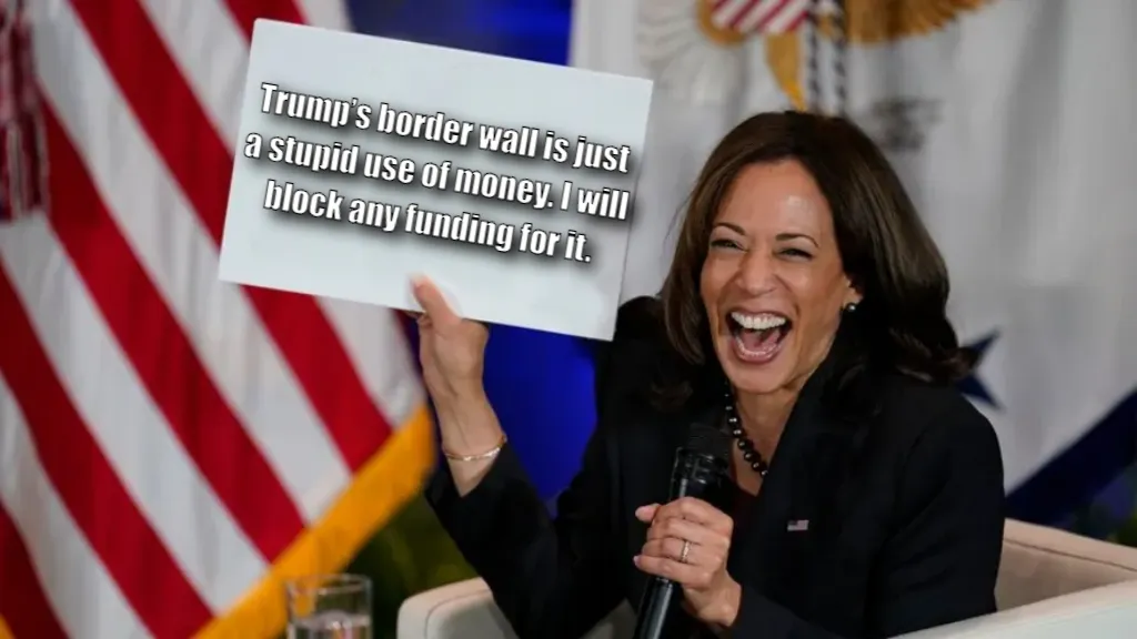 Kamala Harris holding sign