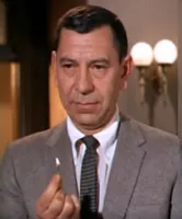 Joe Friday Lights a Match