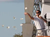 Leonardo DiCaprio throwing Money