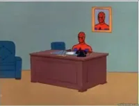 Spider man behind desk