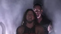 Undertaker teleports behind AJ Styles